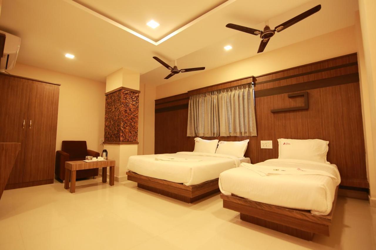Hotel Apple Suites Бангалор Экстерьер фото
