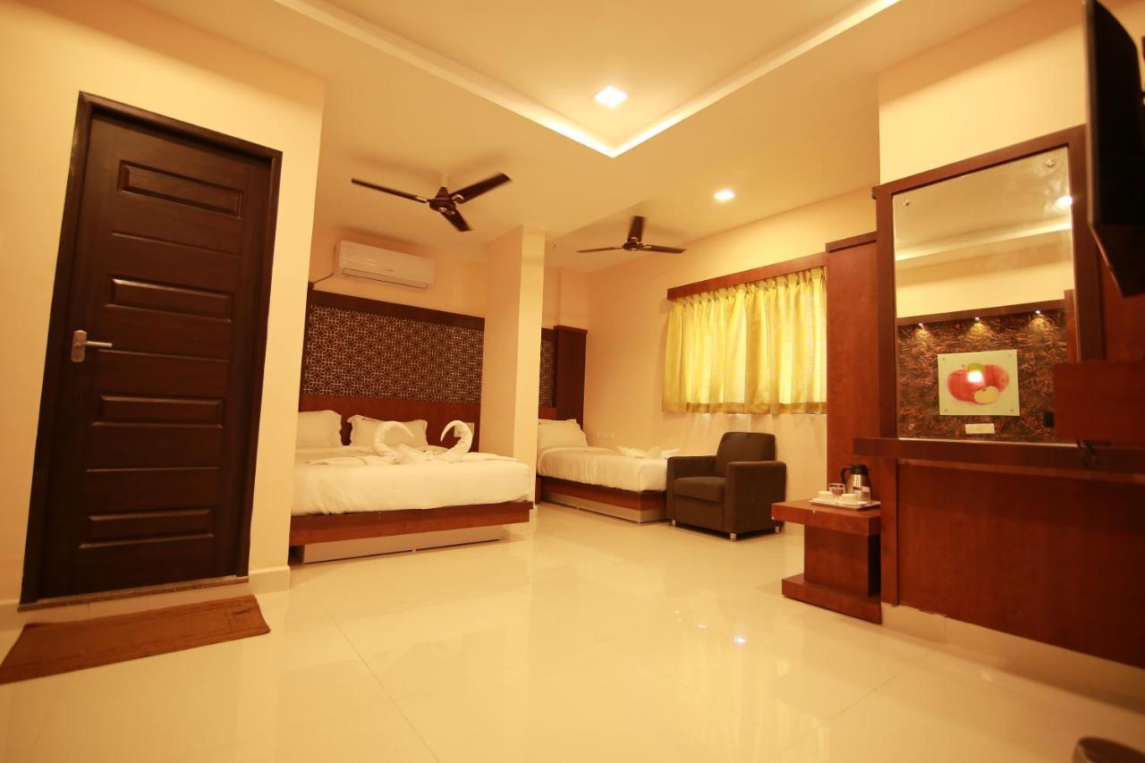 Hotel Apple Suites Бангалор Экстерьер фото